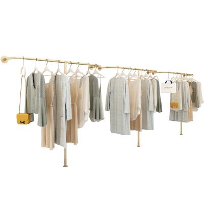 China Clothing Store Light Luxury Texture Display Chrome Steel Commercial Garment Rack Clothes Nano Gold Wall Mounted Clothing Racks for sale