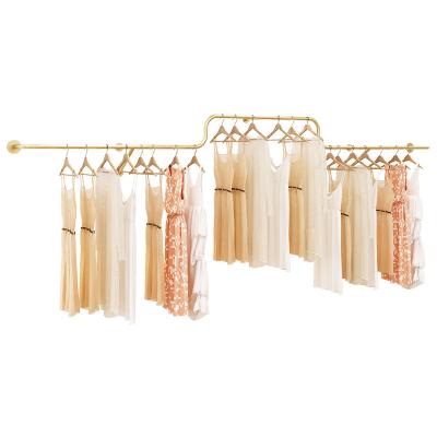 China Clothes Shop Nordic Simple Poles Gold Metal Pipe Display Clothes Racks Stainless Steel Metal Clothes Rack Wall Mounted For Stores Boutique for sale