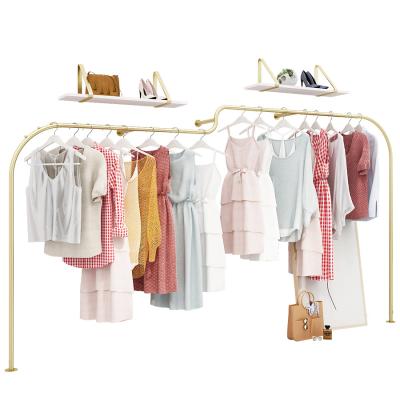 China Clothing Store Women Shop Cloth Dress Rack Clothing Rack Metal Wall Display Mounted Stainless Hanger On Wall for sale