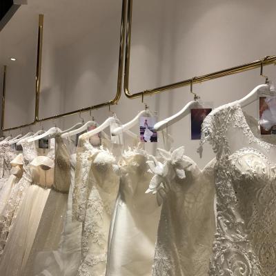 China Clothes shop wedding dress rack stainless steel wedding shop decorations gold boutique ceiling bridal clothing racks for wedding dresses for sale