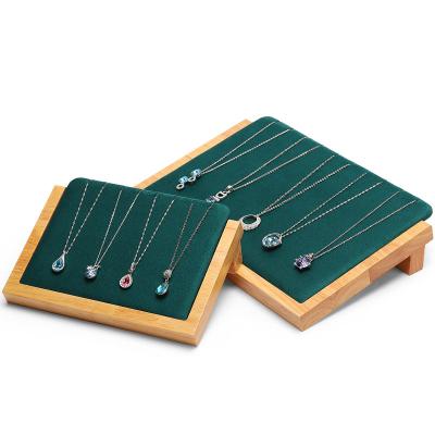 China Jewelry Store Green Solid Wood L Shaped Necklace Dish Jewelry Display Props Jewelry Rack Shop Counter Decoration Pendant Display Stand for sale