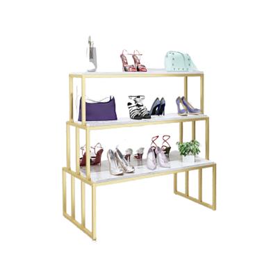 China Shiny Marble Grain Gold Metal Frame Stainless Steel Handbag Clothing Shoes 3-Tier Mall Shops Show Table Rack for sale