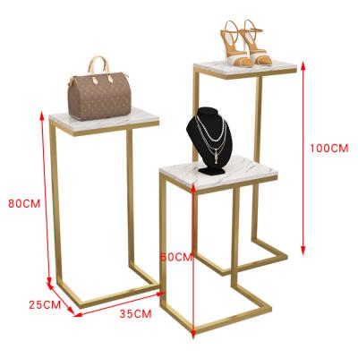 China Shop 3pcs/set Shop Nested End Table Set Clothing Store Gold Worktop Handbag Shoe Rack Metal Nesting Display Table for sale