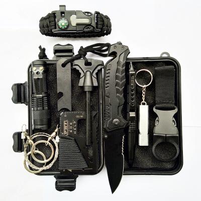 China Lightweight 10 in 1 Outdoor Camping and Hiking EDC Survival Tactical Tool Kit with Compass Torch Dagger Flashlight for sale