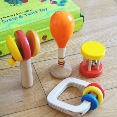 China Musical Wooden Toy Newborn Hand Holding Natural Wooden Teether Rattle Baby Teether Rattle Toy For Baby for sale