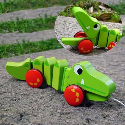 China 100% Eco-friendly Wooden Pull Along Crocodile Walking Toy Wood Animal Walker Car Pull Animal Toy For Toddler for sale