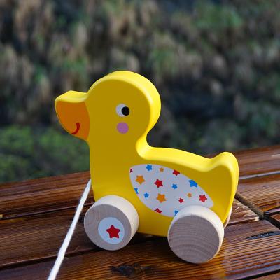 China Pull Along Wooden Dog Baby Walking Training Walk Along Toy Wooden Animal Pull Along Toy For Toddler for sale