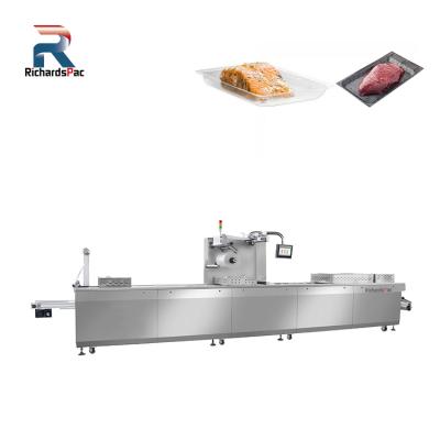 China Food Thermoforming Skin Packaging Machine for Pork Beef Salmon Seafood for sale