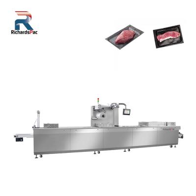 China Food Vacuum Skin Packaging Machine For Food From China Bacon Cheese Salmon for sale