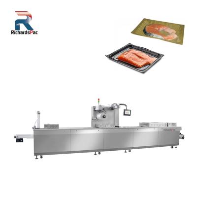 China Food Vacuum Skin Packaging Machine Thermoforming Function For Food Bacon Salmon Slice Cheese for sale