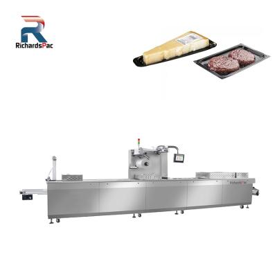 China Food Advanced Thermoforming Vacuum Skin Packaging Machine Tray Skin Packer for sale