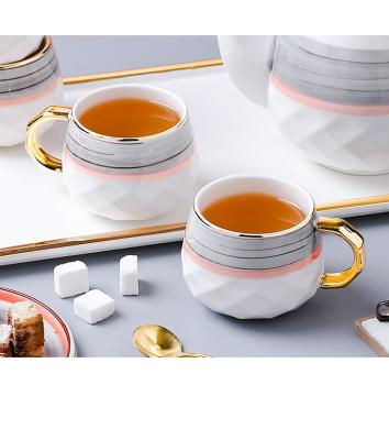 China Viable Light and Exaggerated Porcelain Tea Set Tea Cup and Saucer Set Porcelain Tea Set for sale