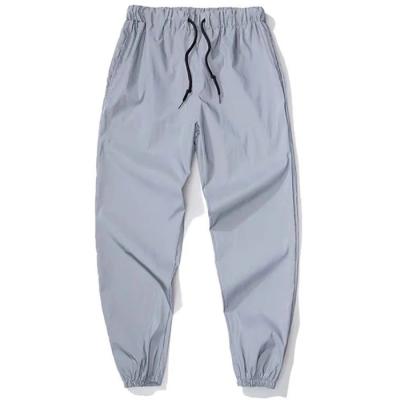 China Hot Selling Reflective Mens Sports Pants Mens Anti-Wrinkle Track Cargo Pants for sale