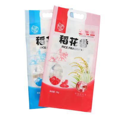 China Moisture Proof Custom Rice Wheat Flour Packaging Bag Stand Up Pouch Laminated 1kg 2kg 5kg 10kg Nylon Rice Plastic Packing Bag With Handle for sale