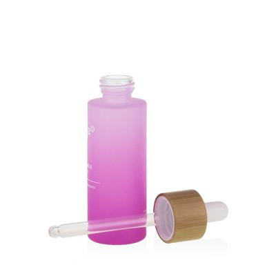 China Eco-Friendly Cosmetics Packaging Pink 60ml Bamboo Glass Bottle With Dropper Pipette Empty Bottles For Perfume Oil for sale