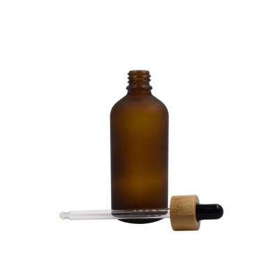 China 50ml 100ml Cosmetics Massage Body Oil Glass Bottles Eco-Friendly Packaging Amber Glass Bottle With Serum Dropper Bamboo Tube for sale