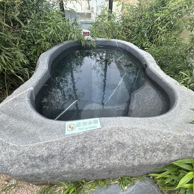 China Freestanding Large Natural Boulder Hand Carved Stone Bathtubs Freestanding Pedestal Bathtub for sale