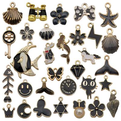 China Fashionable Jewelry Findings 31pcs/pk Shape DIY Black Charm Accessories Plating Mix Drip Metal Alloy For Jewelry Charm Pendant Accessories for sale