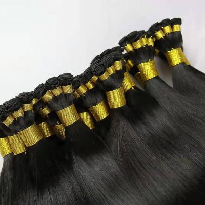 China Silky Straight Wave Double Hand Remy Russian Drwan Amara Tied Weft Good Quality Hand Tied Hair Weft Extension In Stock for sale