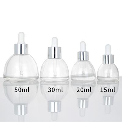 China New Design 15ml 30ml Cosmetic Half Round Glass Dropper Essential Oil Face Serum Bottle for sale