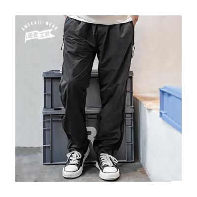 China Maden Casual Football Jogging Sports Breathable Trousers Zipper Pants For Men for sale