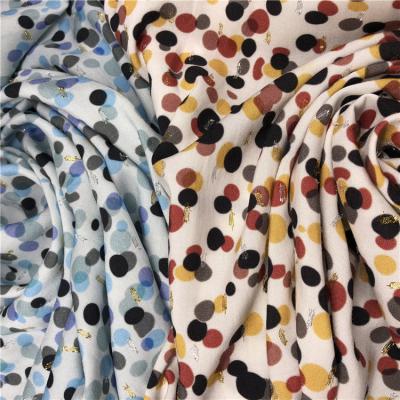 China 75% Rayon 25%Metal Soft Touch QUICK DRY Polka Dot High Quality Hang Down Feeling Cut Out Printed Fabric For Ladies Dress for sale