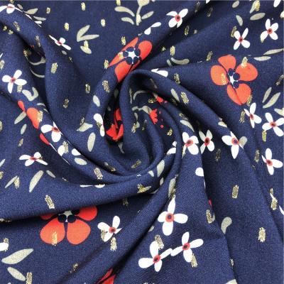 China New Trend Fashionable Flower Pattern Rayon Metal Cut Printing Fabric For Ladies Garment for sale