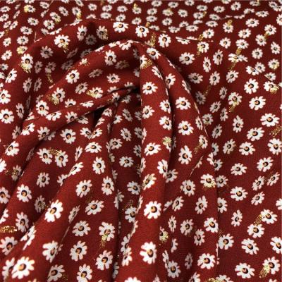 China New viable trend small daisy design rayon metal cut printing fabric for ladies dress for sale