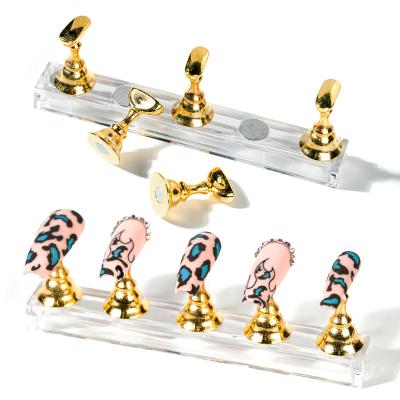 China 5pcs/Set Pretty Magnetic Nail Holder False Nail Tip Practice Holder Crystal Base Holder Nail Art Display for Art Salon DIY and Practical for sale