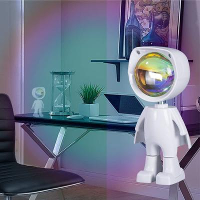 China Sunset Projection Light Robot Figure Lamp Modern LED Rainbow Atmosphere Lamp for sale