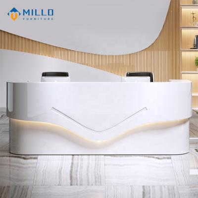 China Custom Modern Luxury White C Shape Desk Front Desk Wooden Office Beauty Salon Spa Reception Desk With Led Light for sale