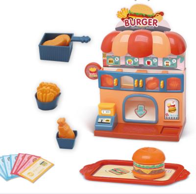 China 2021 Latesttoy Plastic Kids Kitchen Toy Simulation Burger Station And Fruit Squeezer Set With Light And Music For Kids for sale