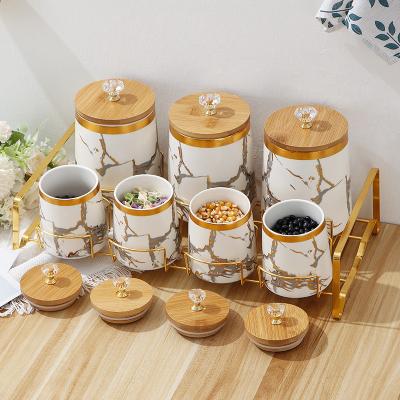 China Freshness Preservation Factory Direct Sales Household Storage Jars Kitchen Supplies Stretch Cover Bamboo Marble Ceramic Sealed Jar Set for sale