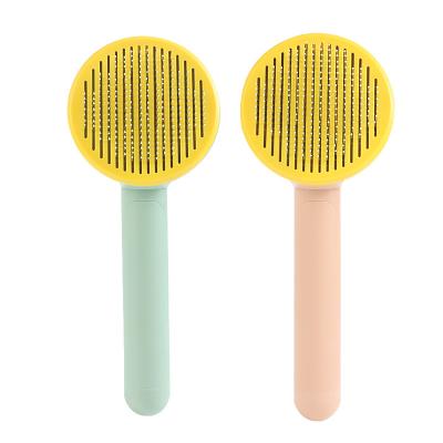 China Stocked New Product Licking Dog Comb Self-cleaning Floating Needle Pet Hair Comb Cat for sale