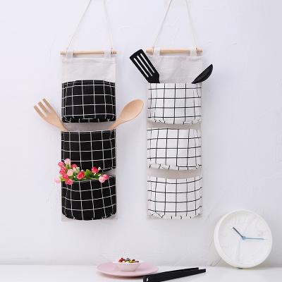 China Simple and elegant hanging canvas hanging sofa bedside viable household storage bag cotton organizer bag storage bag for sale