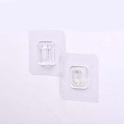 China Light Luxury Multi-Function Seamless Luxury Patch Wall Mounted Router Punch Rack Holder Socket Holder Adhesive Button Hook for sale