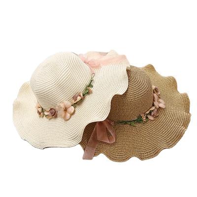 China Large Picture Eaves Sun Shade Straw Hat Female Summer Flower Wave Brim Beach Hat Travel Sun Protective Hats for sale