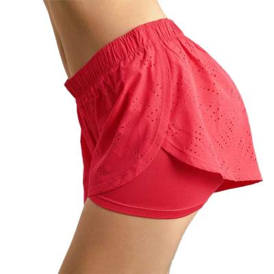 China Antibacterial Quick Dry Women Shorts Double Layer Sports Shorts Pants Yoga Shorts With Hole for sale