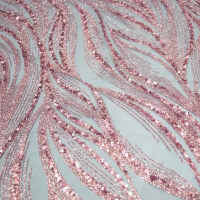 China Sustainable Sequins Bridal Luxury Lace Fabric Embroidery Beads Wedding Tulle Beaded Lace Fabric for sale