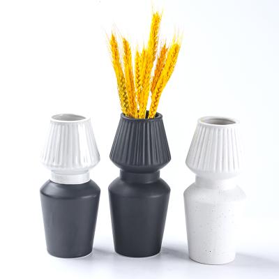 China Europe elegant modern nordic style ceramic flower vase and vases lamp design matte porcelain for ceramic decor and home decor for sale