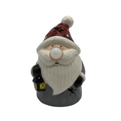 China Europe 2022 Latest Style Christmas Decoration Christmas Festival Ornament Ceramic Santa Figure With Led Light for sale