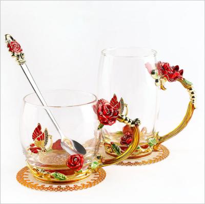 China Single Wall Cup Stocked Rose Diamonds Glass Mug Gift Flower Tea Cup Metal Handle Saucer Butterfly Enamel Butterfly Set with Spoon and Lid for sale