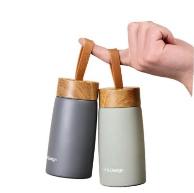 China Business 280ml Wooden Grain 304 Vacuum Thermos Water Cup Mini Bottle Thermo Mug Cute Thermos With Rope Lid for sale