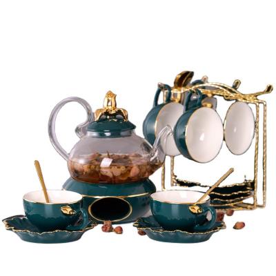 China Full Time Glass Teapot Afternoon Teapot Drinkware Stylish Coffee Tea Cup Set Royal Modern Ceramic Tea Set With Metal Stand for sale