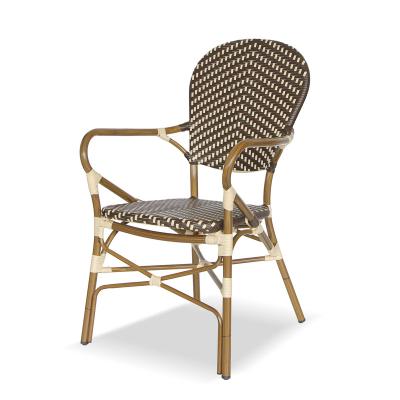 China Rattan Restaurant Furniture Stacking Armrest Bamboo Like Chair French Bistros Outdoor Rattan Dining Chairs for sale