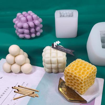 China Hot Sale Soybean Aroma Plaster Disposable Wax Hot Selling Handmade Plaster Silicone Bubble Cube Magic Candle Mold for sale