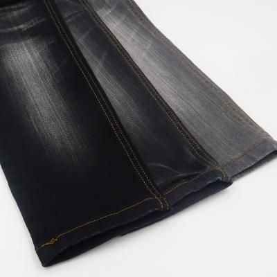 China Breathable Cotton Denim Fabric Black Waxed Sustainable Denim Fabric 100% With Stable Quality Control for sale