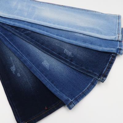 China New Cotton Wicking Breathable Viscous Stretch Woven MenJeans Fabric Heavy Denim With Competitive Price for sale