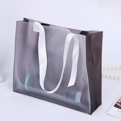 China Recyclable Wholesale Custom Clear Printing Clothing Store Shopping Bag PVC Tote Bag Plastic Bag With Handle for sale