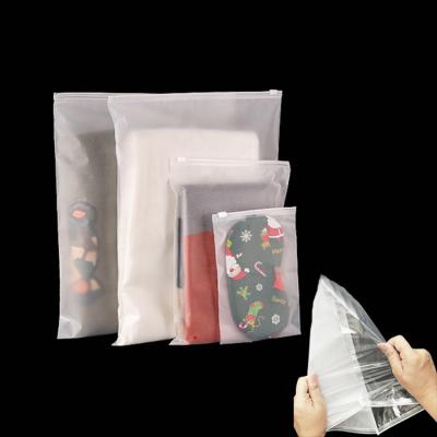 China Recyclable Customized Logo Frosted PVC Zipper Frosted Plastic Clothing Packaging Packing Bag for sale